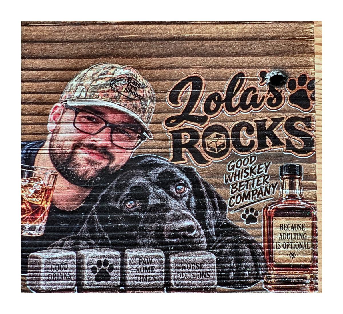 A solid wood whisky box printed in full colour with a portrait, a dog and custom lettering